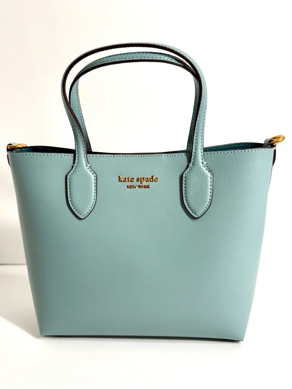 Kate Spade New York Bleecker Medium Crossbody Tote in Aegean Teal.